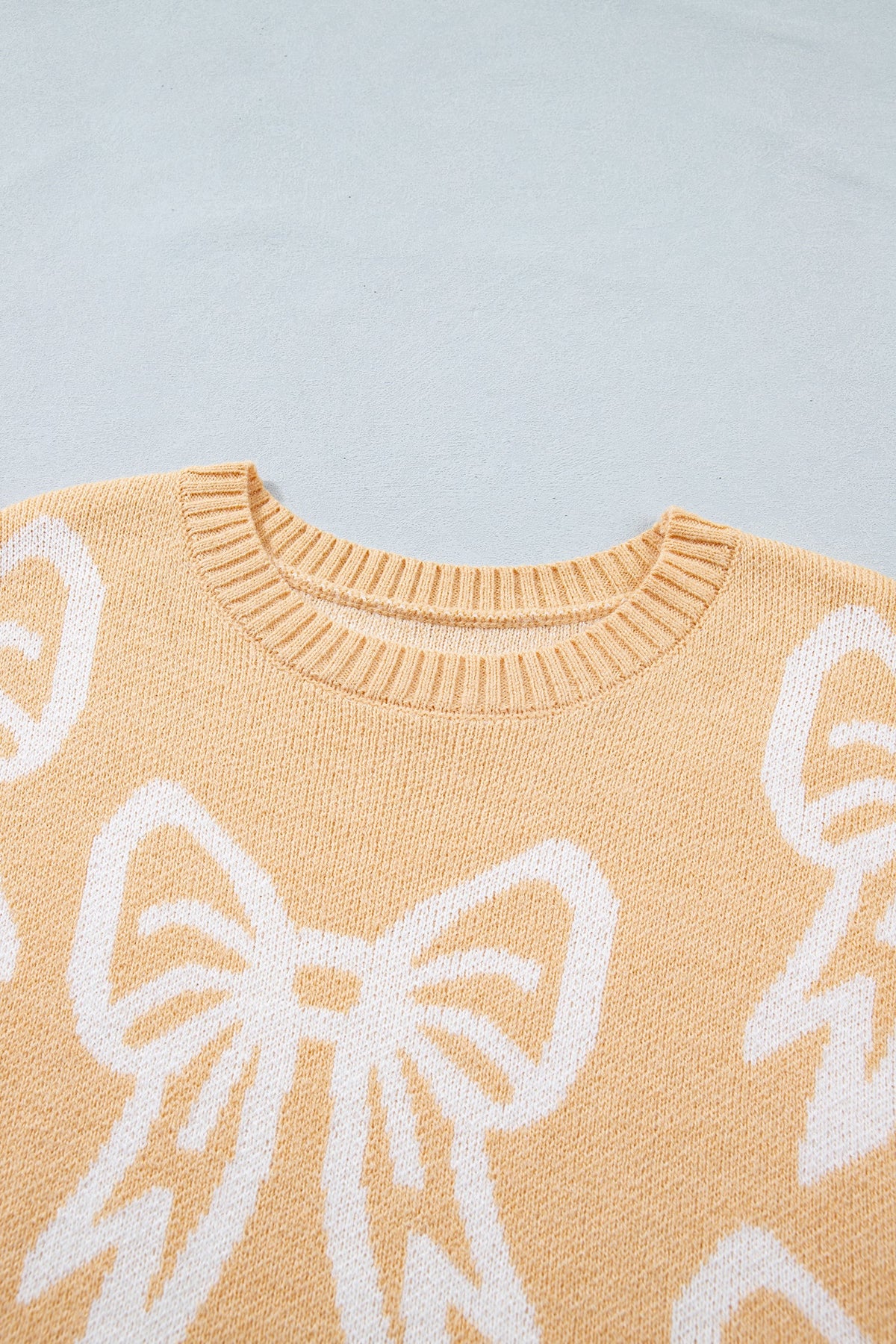 Golden Fleece Bow Pattern Drop Shoulder Loose Sweater
